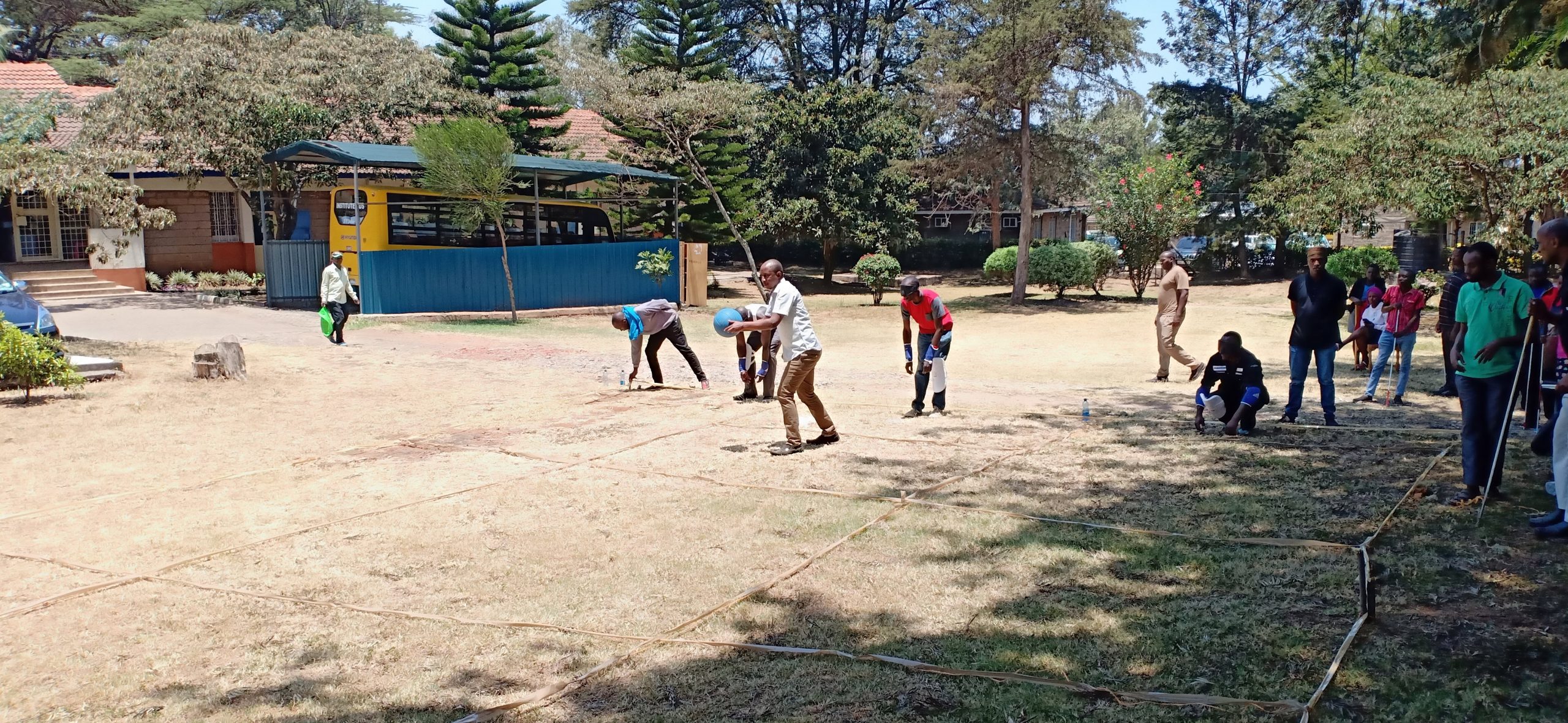 Blind students playing goal ball